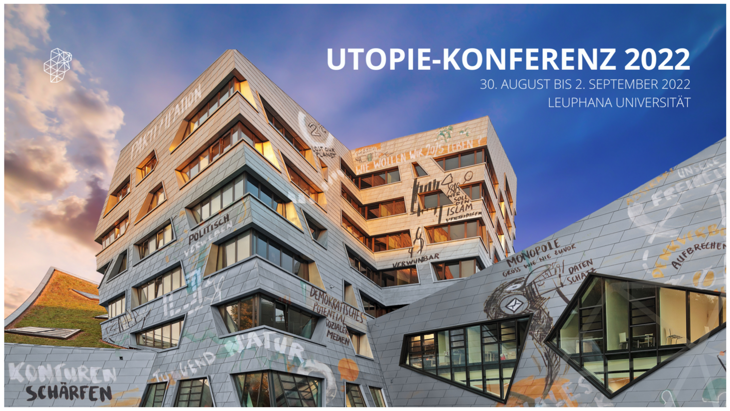 Teaserbild der Leuphana Utopie-Konferenz 2022 Bild des Leuphana-Zentralgebäudes mit utopischem Graffiti
