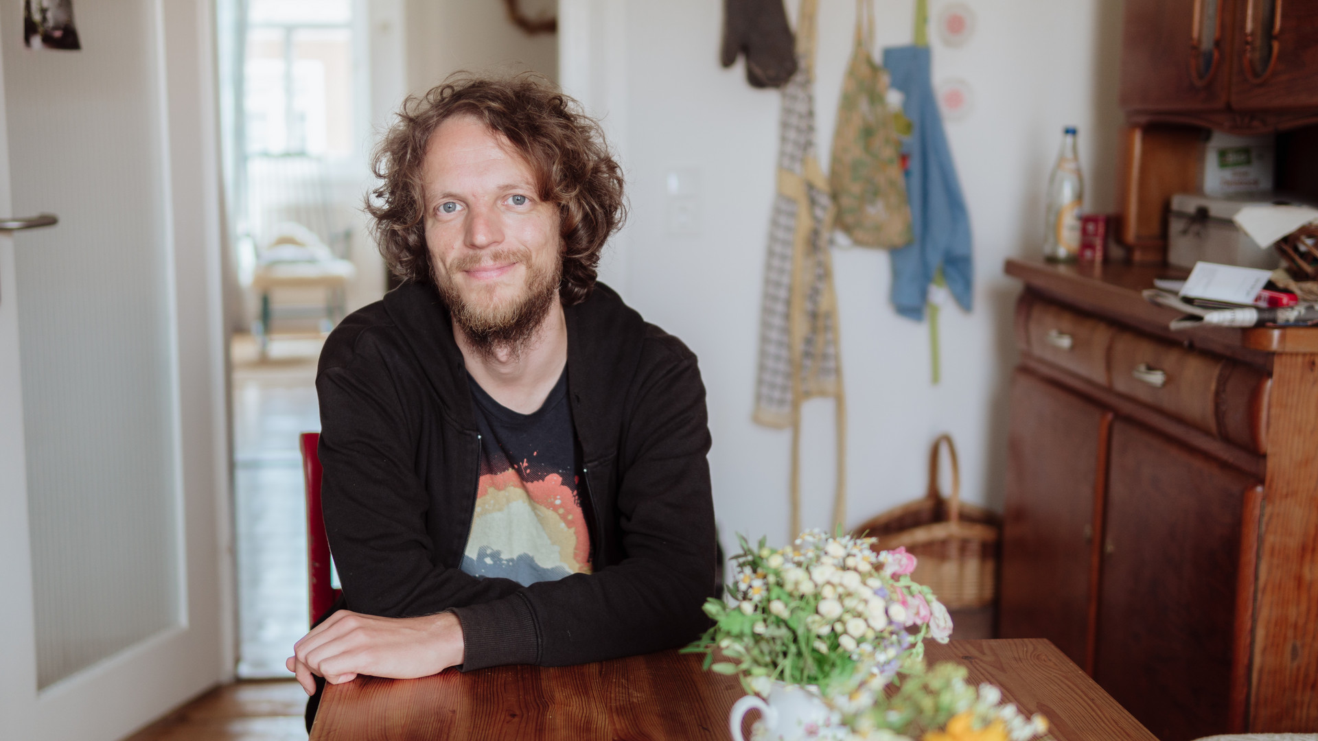 Picture shows Gerhard Reese sitting at a kitchen table