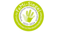 [Translate to Englisch:] Bild mit Text: FaMi-Siegel