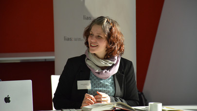 LIAS Fellow Verena Adamik smile and listens to another participant that isn't pictured