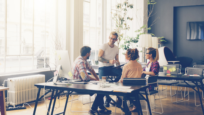 Young business people working at office on new project